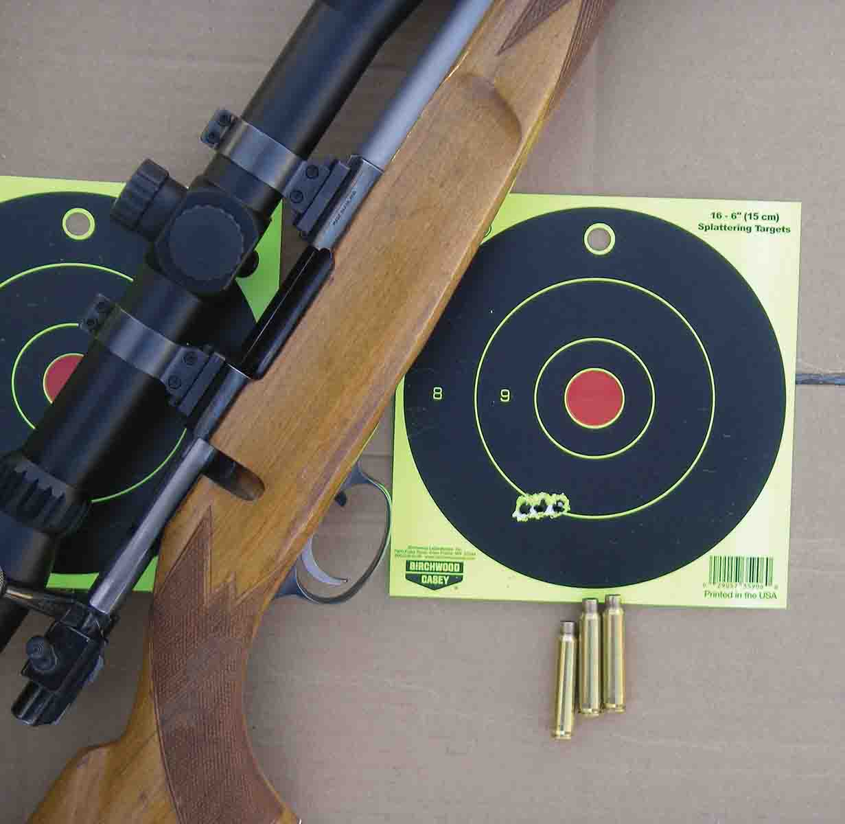 This three-shot group was fired in 20- to 30-mph wind gusts, which explains the stringing. Groups obtained in good conditions hovered around 3/8 inch at 100 yards, including some .5-inch groups with both the pistol and rifle.